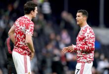Maguire (left) and Ronaldo in a chat during last season