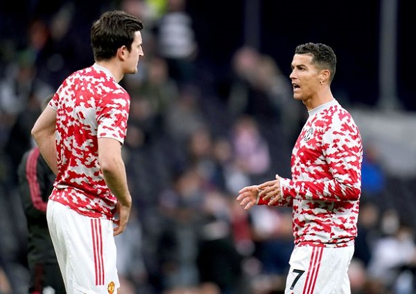 Maguire (left) and Ronaldo in a chat during last season