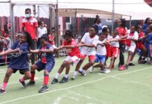 The school children performing tag of peace during the sporting activities