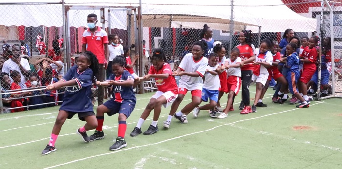 The school children performing tag of peace during the sporting activities