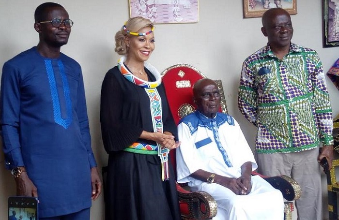 • Odeneho Dadeako Nsiah-Ababio (seated), Grace Jeanet Mason (second from left) and Mr George Yaw Boakye (right), Ahafo Regional Minister after the visitsaid