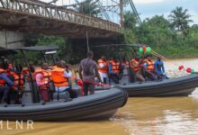 • Mr Jinapor and other officials being taken through the operations of the speed boats