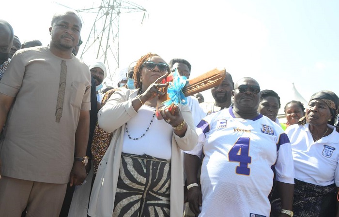 Mrs Koomson(2nd from left) symbolically closing the sea with a wooden key. With her are Mr Ashitey (left) and Nii Mator (3rd from left)