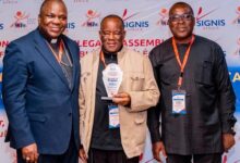 • Sir Assorow (middle) with his award. With him are other dignitaries at the programme
