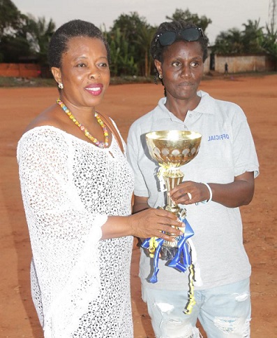 • Dzromo Adzekwei and Hon Abaidoo displaying one of the trophies