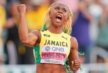 • Jamaica's Fraser-Pryce celebrates after her World Championships triumph