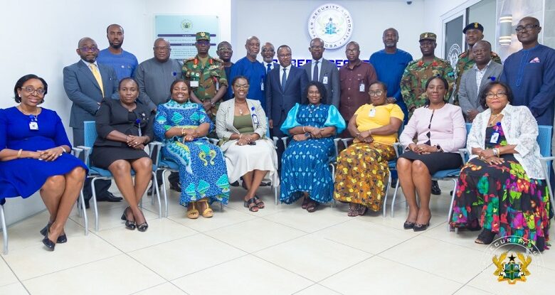 • Mrs Owusu-Ekuful (seated fourth from left) with the committee members