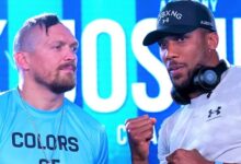 Usyk (left) faces Joshua in a huge rematch next month