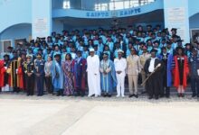 The graduands with the dignitatries after the graduation ceremony