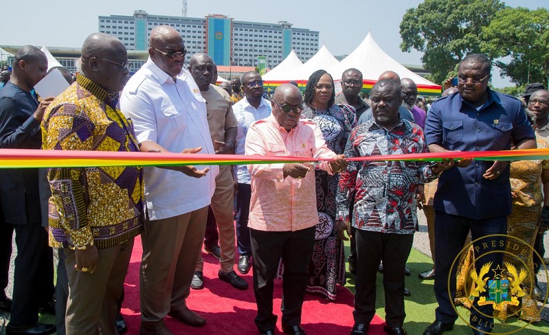 • Inset: President Akufo-Addo (middle) cutting tape to hand over the buses