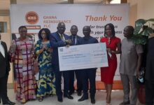 • Mr Otoo (fourth left) presenting a dummy cheque to Amb. Boateng