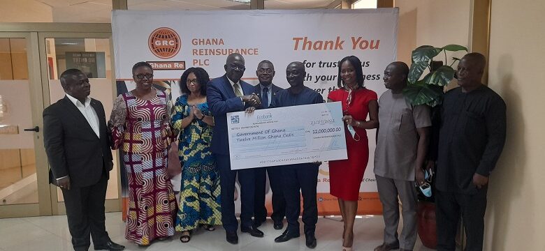 • Mr Otoo (fourth left) presenting a dummy cheque to Amb. Boateng