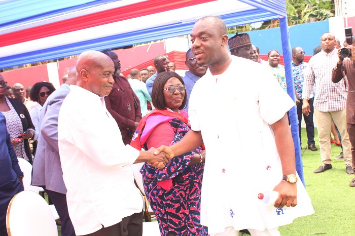 • Mr Justin Kodua Frimpong (right) exchanging greetings with Mr Stephen Ntim at the anniversary. With them include Mrs Akosua Frema Osei-Opare (middle) Chief of Staff Photo. Ebo Gorman