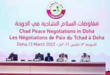 Participants take their seats on the podium as the Chad Peace Negotiations start in Qatar's capital Doha