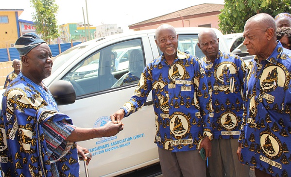 • Inset: Mr Seth Sesi Ametefe (third from right) presenting the keys to the vehicle to Chief Issah Yahaya,Northen Regional Chairman, SSNIT Pensioners. Photo: Ebo Gorman