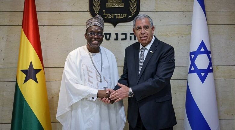 Mickey Levy (right) welcoming Mr Alban Sumana Kingsford Bagbin (left) to his office