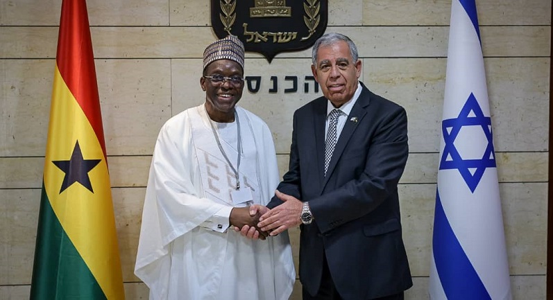 Mickey Levy (right) welcoming Mr Alban Sumana Kingsford Bagbin (left) to his office