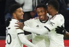 Sancho (centre) scored United's third on the day
