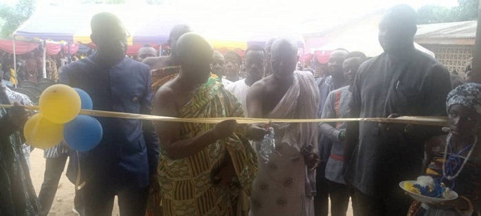 • Togbe Patamia Dzekle VII (2nd from left) being assisted to inaugurate the project