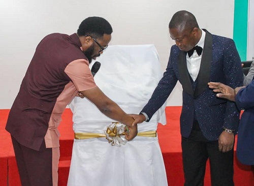 Moses Baffour Awuah Second Left (Inset) Dr Amarachi Ugoji and Dr Solomon Ababio-Adjeman Cutting Ribbon for Launch.