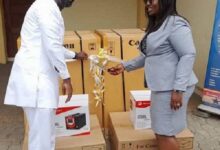 • Mr Edwin Provencal left) presenting the items to COP Maame Yaa Tiwaa Addo-Danquah