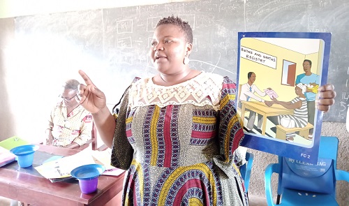 Ms Bature (inset) addressing the people