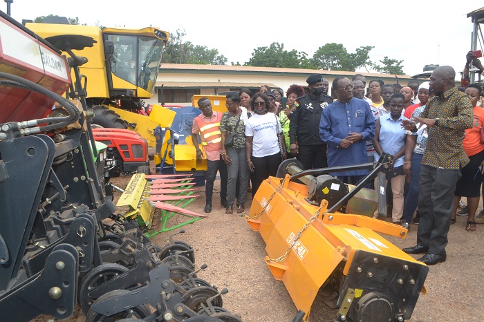 Dr. Owusu Afriyie-Akoto (second from right) and other dignitaries inspecting some of the farming machines Photo Victor A. Buxton