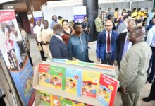 • Mr Edward Yaw Udzu (left), Director of ALLBOOOKS Ltd with Mr Irchad Razaaly (third from right), Mr Abdourahamane Diallo (second from left) and Mr Asare Konadu Yamoah at the one of the exhibition stands Photo: Geoffrey Buta