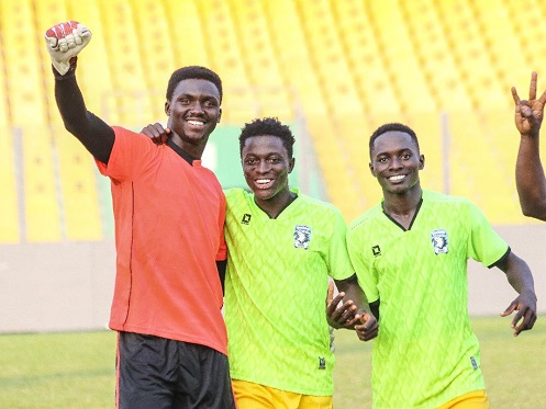 • Shoot-out hero goalkeeper Aziz Dari Harunah (left) celebrating with Emmanuel Owusu and Paul Quaye Jnr after the final save Photo: Raymond Ackumey