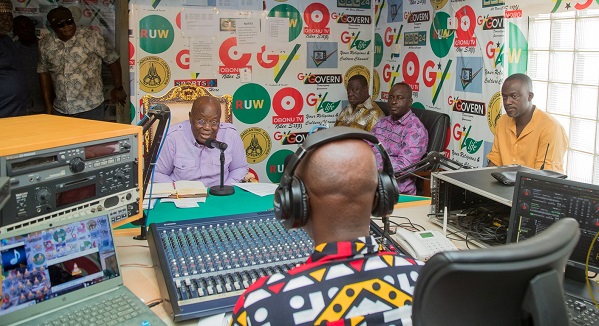 • President Akufo-Addo(with mic) responding to questions during the interview