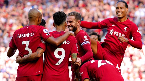 • Liverpool players celebrate Roberto Firmino's second goal against Bournemouth