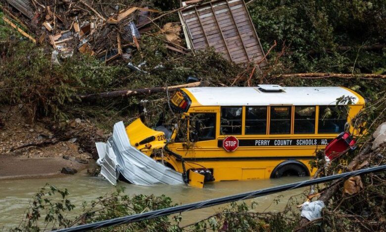 A school bus sits in a creek following heavy rains near the city of Jackson