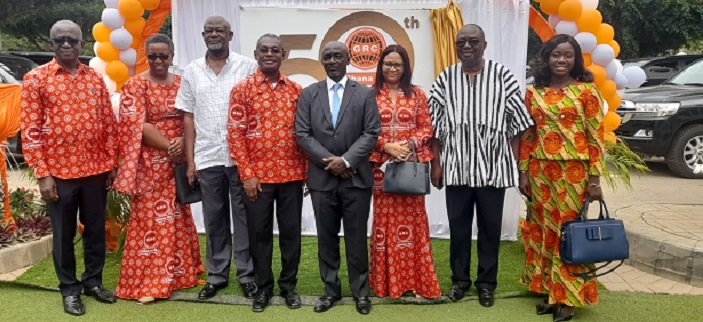 • Mr George Otoo (left) and other dignitaries after unveiling the logo