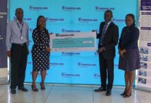 Mr Seth Ampaabeng Kyeremeh (second from right) receiving the cheque from Prof. Yeboah-Manu