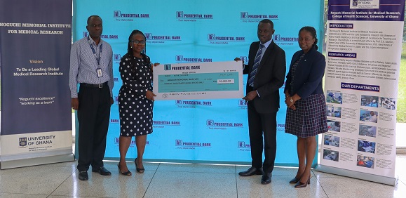 Mr Seth Ampaabeng Kyeremeh (second from right) receiving the cheque from Prof. Yeboah-Manu