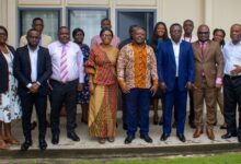 Mr Joseph Cudjoe ( fifth from left), Mr Martin Adu-Owusu (third from right) with management members of NTC and Public Enterprises after the meeting