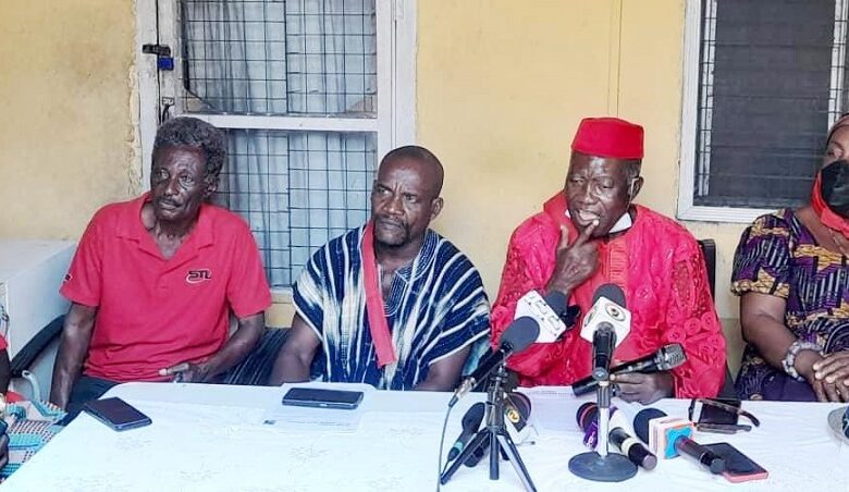 • Nii Akumiah (second from right) with some of his elders seated by him addressing the media