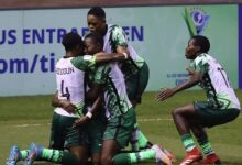• Nigeria celebrating the goal that sent them to the quarters