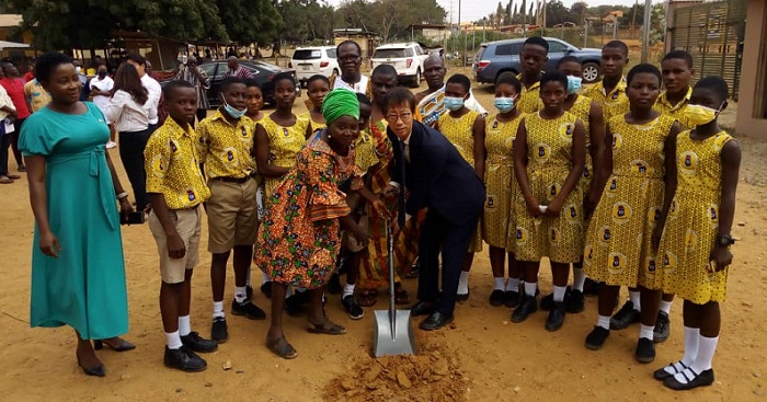 Mr. Mooheon Kong and Mrs Regina Amegah cut sod for the commencement of the project
