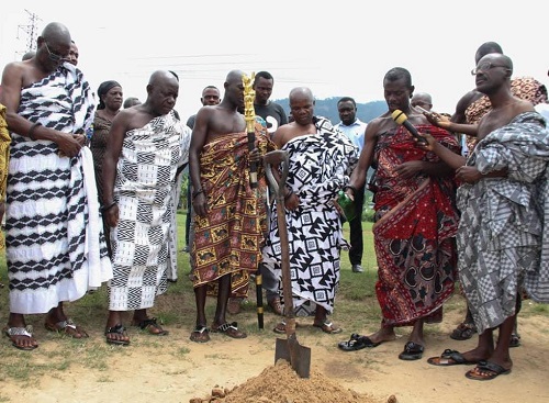 Nana Kwesi Dwamena, Krontihene of Kwahu Obomeng (second from right) supported by some sub-chiefs from Kwahu Obomeng, pouring libation ahead of the sod-cutting