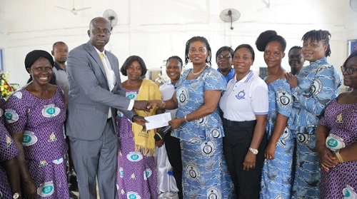 • Supt Rhodaline Annor with the POLAS members presenting undisclosed cash to Chaplain Chief Inspector Samuel Danso Marfo