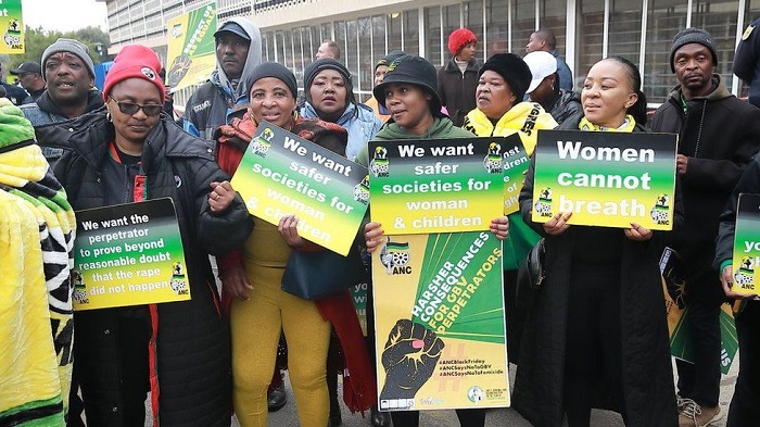 • Women's rights protesters outside the court in Johannesburg last week