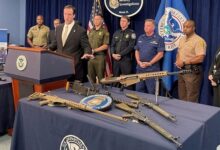 Mr Salisbury displayed some of the weapons seized that had been destined for Haiti