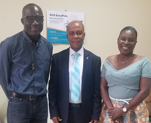 Justice Kofi Akowiah(middle) with Kingsley E.Hope and Georgina AmaAnkomah, secretary