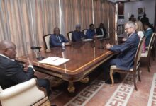 President Akufo-Addo (left) interacting with Philipp Stalder (right) and other dignitaries