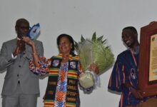 Mrs Virginia Ofosu-Amaah displaying the Husband's award . Photo Godwin Ofosu-Acheampong