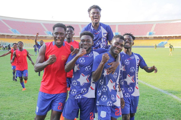 • Two goal hero Oduro (2nd right) joined by team mates to celebrate the victory Picture: Raymond Ackumey