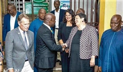 Samuel Abu Jinapor (2nd from left), Minister of Lands and Natural Resources, in a handshake with Virginia E. Palmer, US Ambassador, while Edward Case (left), the Leader of the US delegation, looks on
