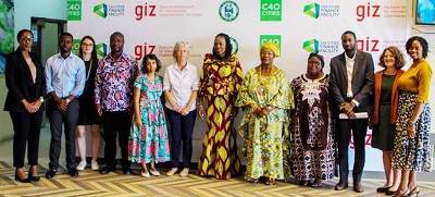 Ms Sackey (6th left) with participants