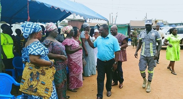 Mr Okyere greeting some of the traders